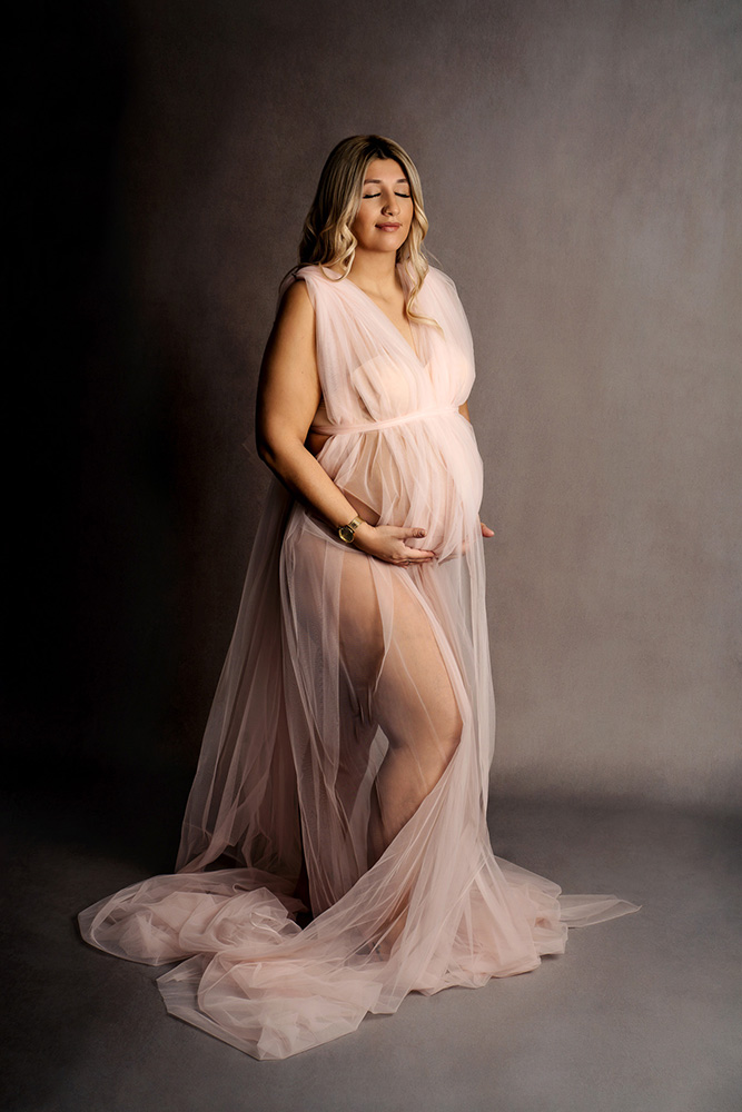 Zartes rosafarbenes Babybauchkleid